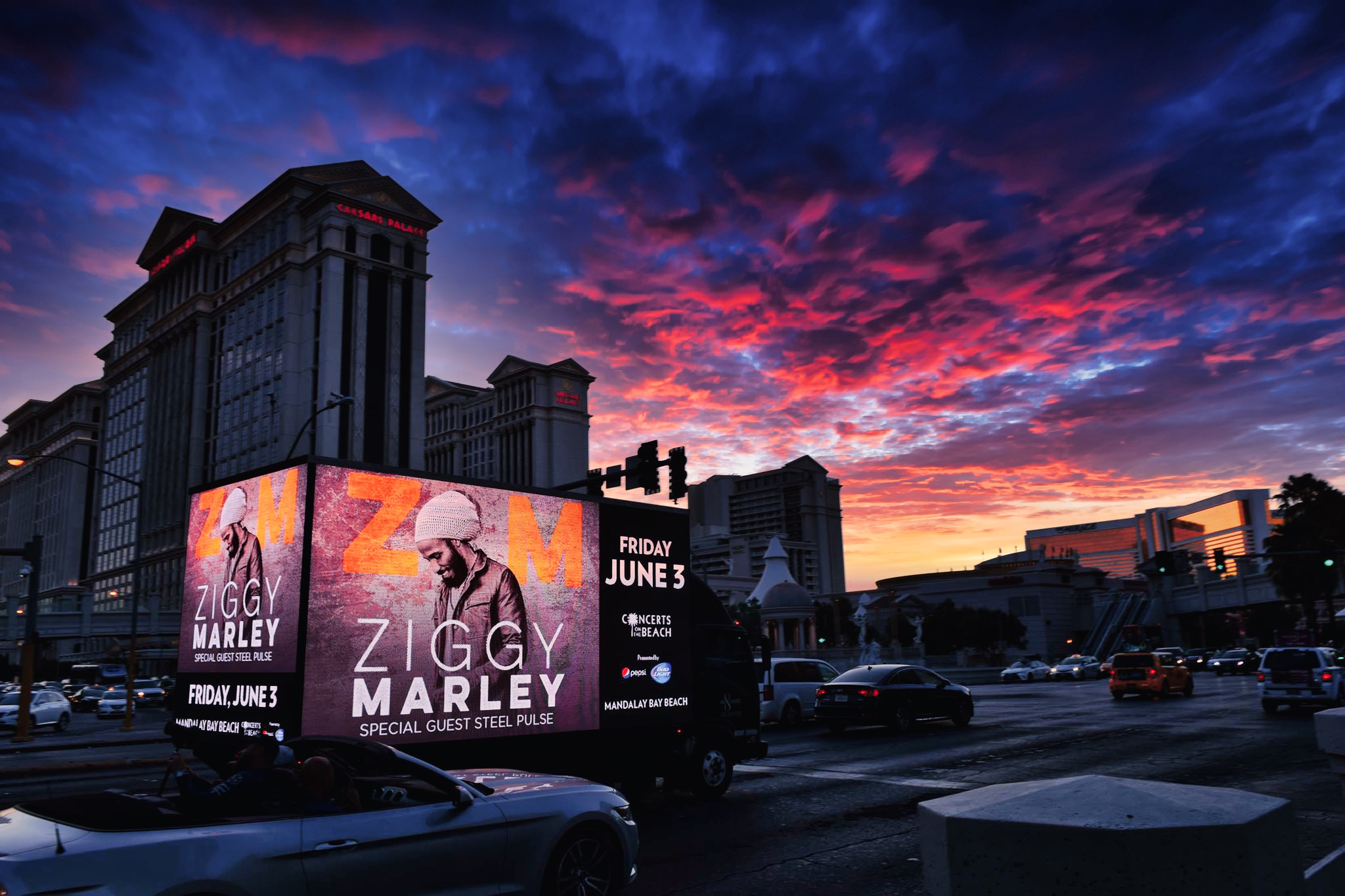 Kre8Media digital mobile billboard truck at sunset